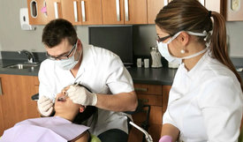 dentist making a dental procedure